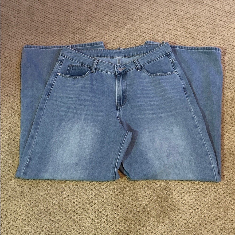 Blue Wide Leg Jeans
Size: 32